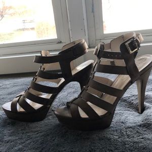 Guess Strappy platform sole sandals.